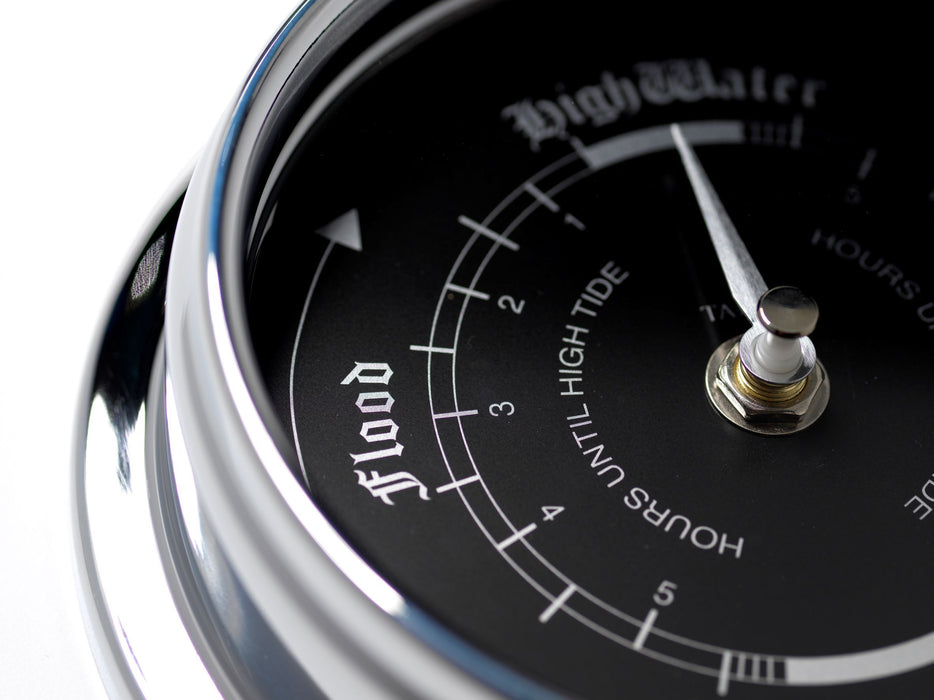 Weather Scientific Tabic Clocks Handmade Prestige Tide Clock in Chrome With A Jet Black Dial created with a mirrored backdrop Tabic Clocks