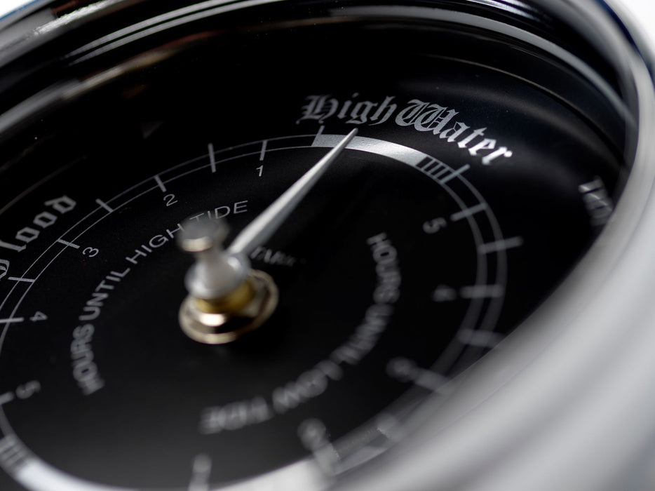 Weather Scientific Tabic Clocks Handmade Prestige Tide Clock in Chrome With A Jet Black Dial created with a mirrored backdrop Tabic Clocks