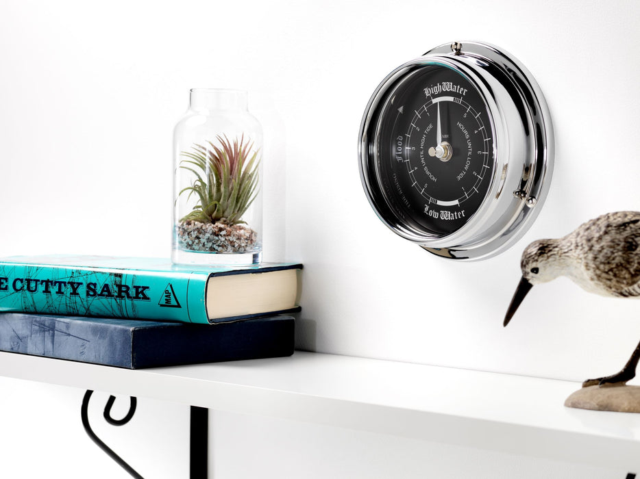 Weather Scientific Tabic Clocks Handmade Prestige Tide Clock in Chrome With A Jet Black Dial created with a mirrored backdrop Tabic Clocks