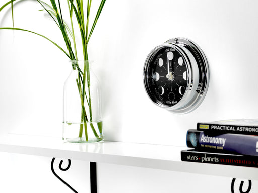 Weather Scientific Tabic Clocks Handmade Prestige Moon Phase Clock in Chrome with Jet Black Dial created with a mirrored backdrop mounted on wall